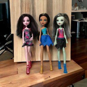 Three monster high dolls